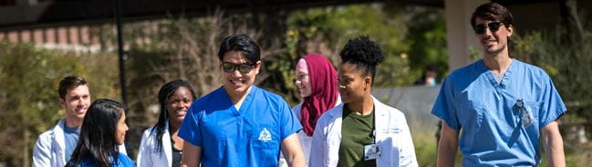 students walking on campus