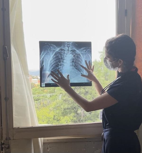 MUSC pediatrics resident Natalie Eidson reviews an X-ray during a global health project in La Taija, Bolivia.