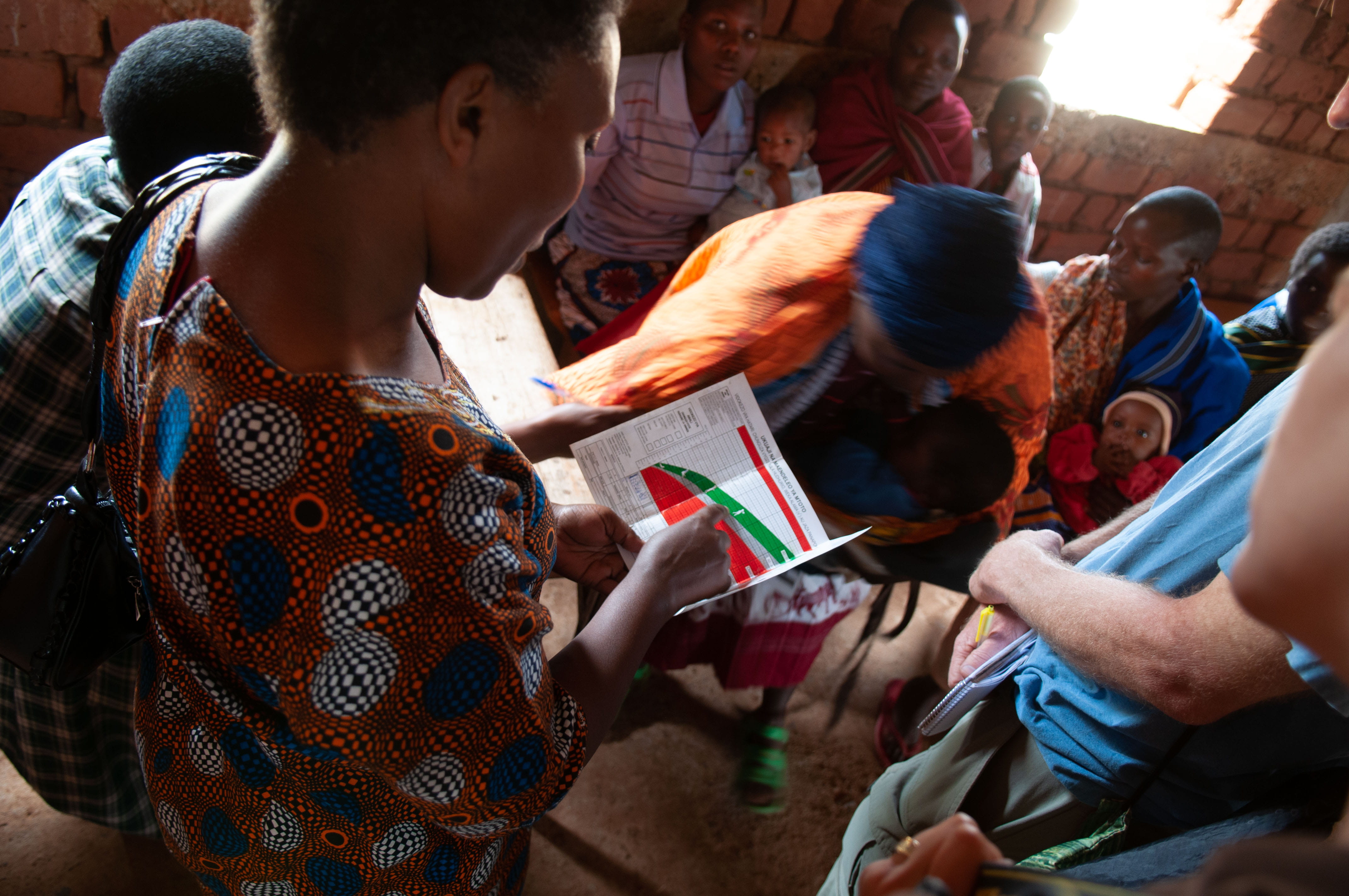 Tanzanian researchers provide community health outreach.
