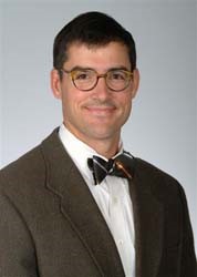 A headshot of Alex Vandergrift