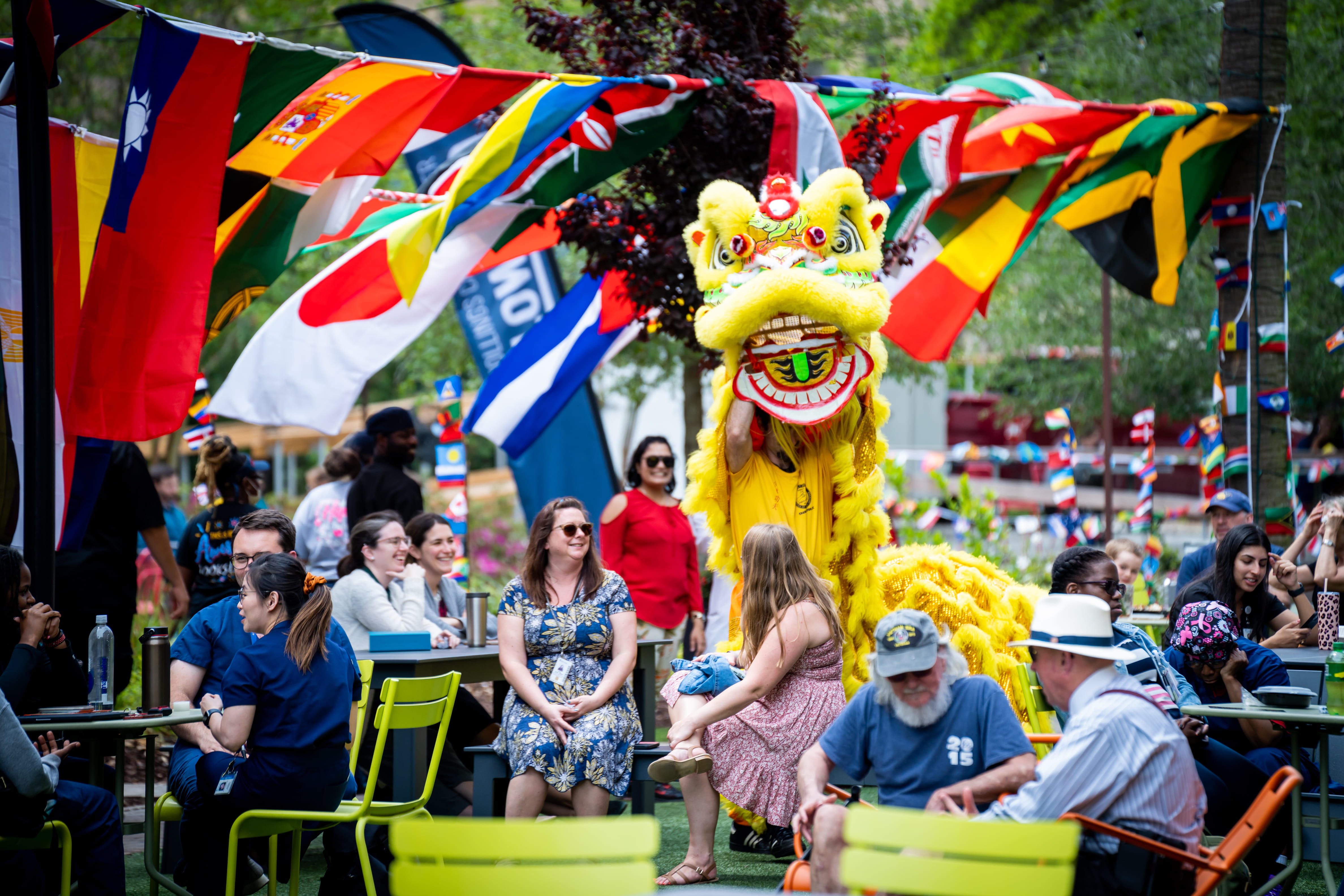 A performer in a Dragon suit performs a traditional Chinese dance at the International Bazaar.
