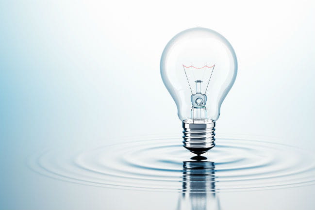 Decorative image depicting a lightbulb floating over a still pool of water.