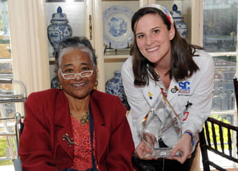 Mrs. Lavelle Higgins with Christian Younts accepting Award for Kelly Lambright(COM)