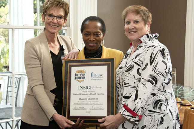 MUSC care team members posing with award