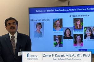 Dr. Zoher Kapasi honoring MUSC employees for their service.