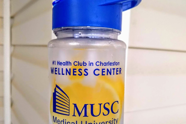 MUSC Wellness Center water bottle filled with water and fruit slices