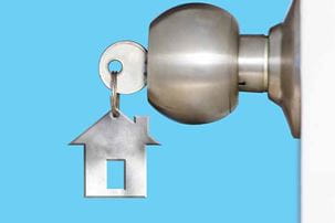 Doorknob with a house key inserted