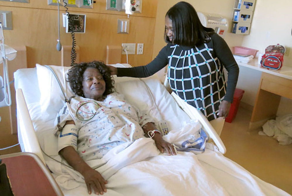 Lucille Robinson recovers from surgery with the help of her daughter, Leotha Wilkins.