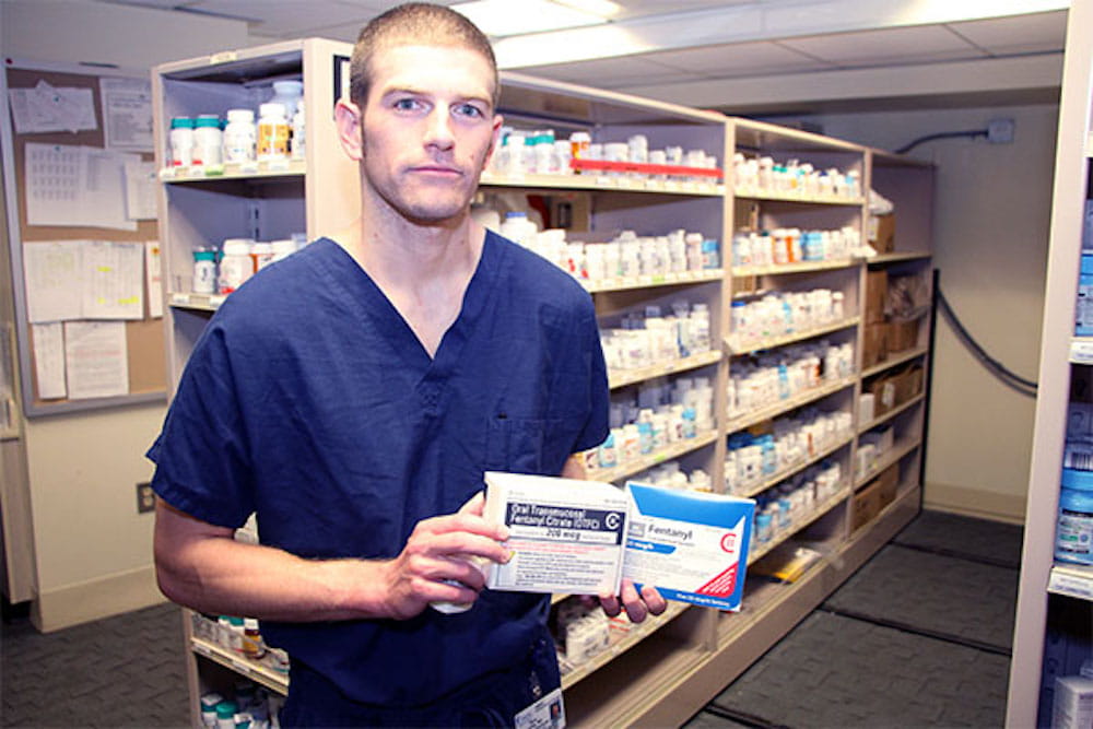 Dr. Ryan Nobles in a pharmacy
