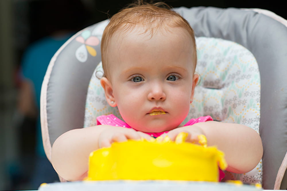 Harper Brown shows she knows how to enjoy her birthday cake.
