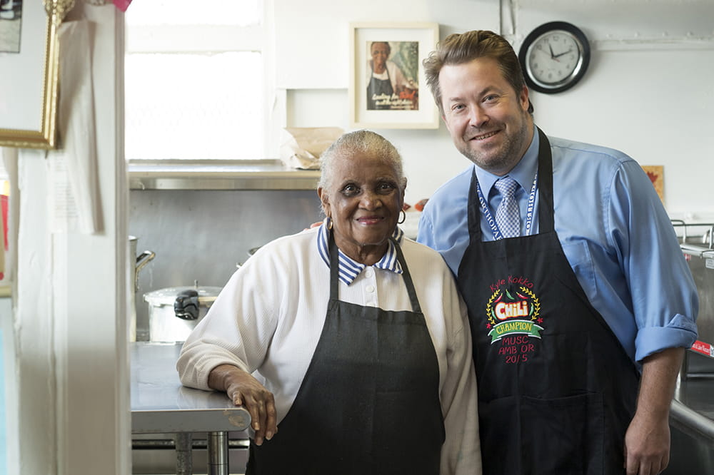 Martha Lou Gadsden and Dr. Kyle Kokko in the kitchen of her namesake restaurant