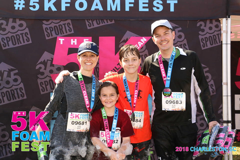 Courtney Nelson (left), seen here with her daughter, Reagan, son, Tanner, and husband Jeff, went from running marathons to not even walking while she was recovering from cancer treatment. Photo provided by Courtney Nelson