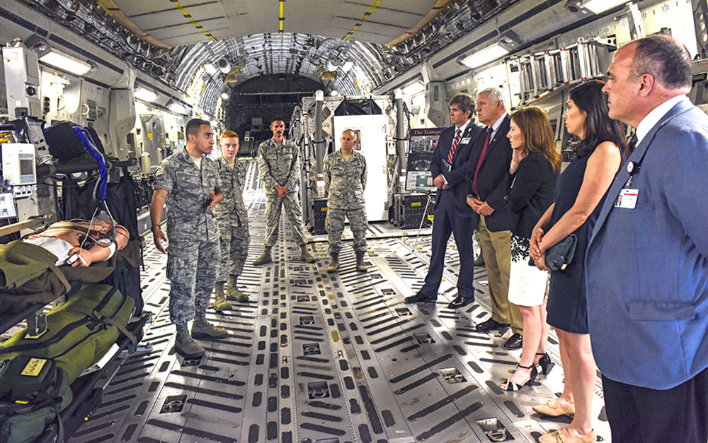 Members of Joint Base Charleston’s 315th Airlift Wing 628th Aeromedical Medicine Squadron brief MUSC leaders Dr. David Cole, Dr. Patrick Cawley and others about readiness.