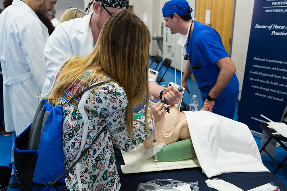 A student tried to insert a tube in a dummy's airway during a career fair