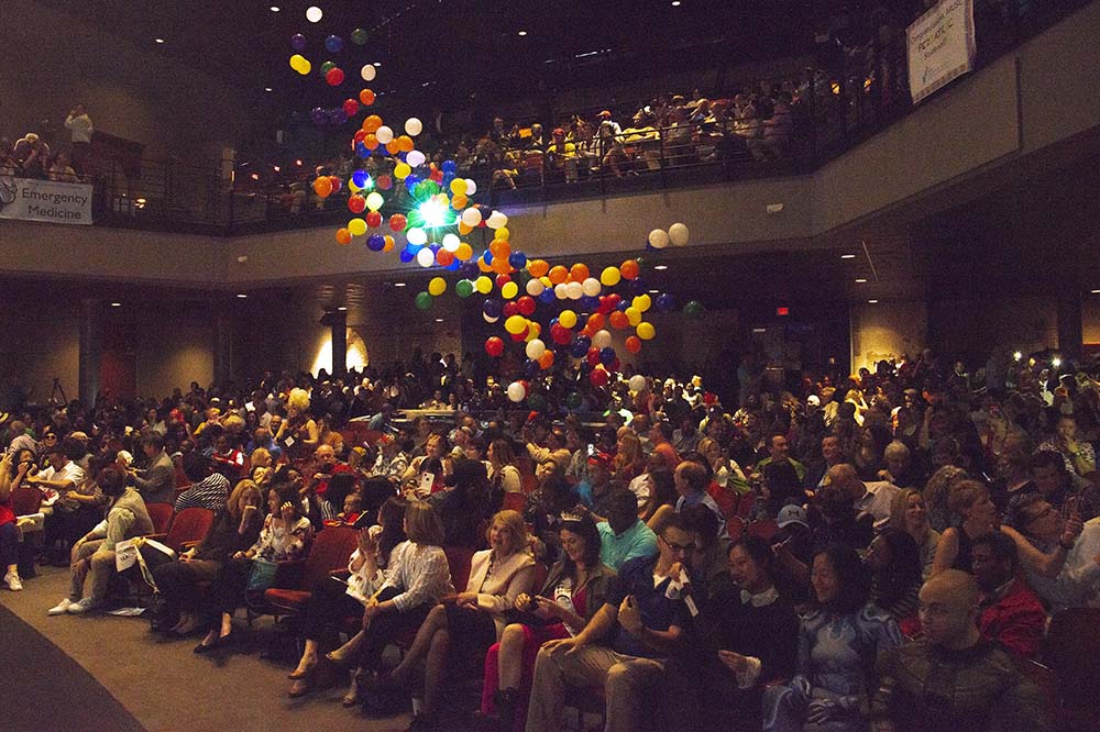 Balloons falling in auditorium