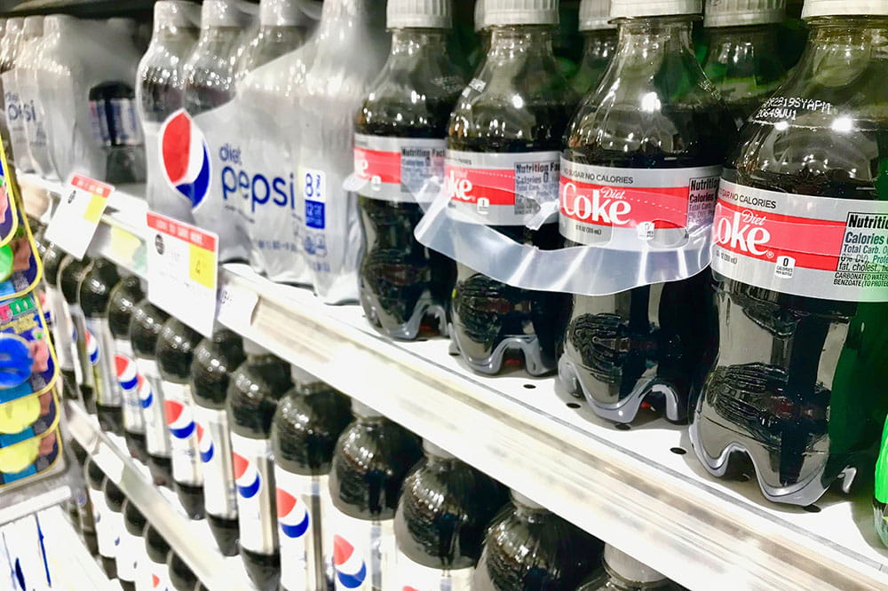 Diet sodas on grocery store shelf