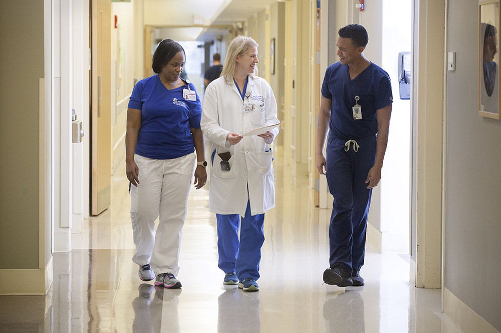 Left to right: Pamela Bowers, BSN, RN  Dr. Heather Simpson M.D.  Keeland Williams, COM student
