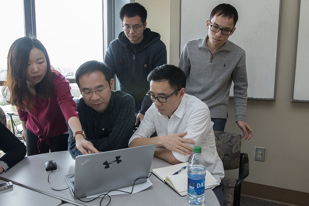 Dr. Changhai Li, second from left, and other Chinese scholars.