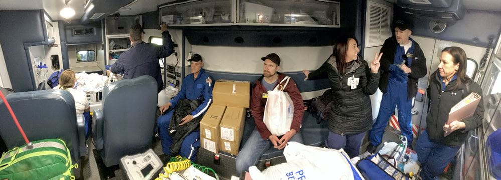 seven people traveling inside an ambulance