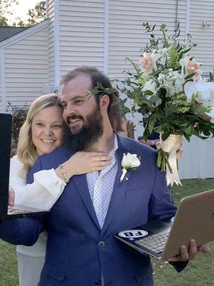 Kara Ellison with her husband at their virtual wedding.