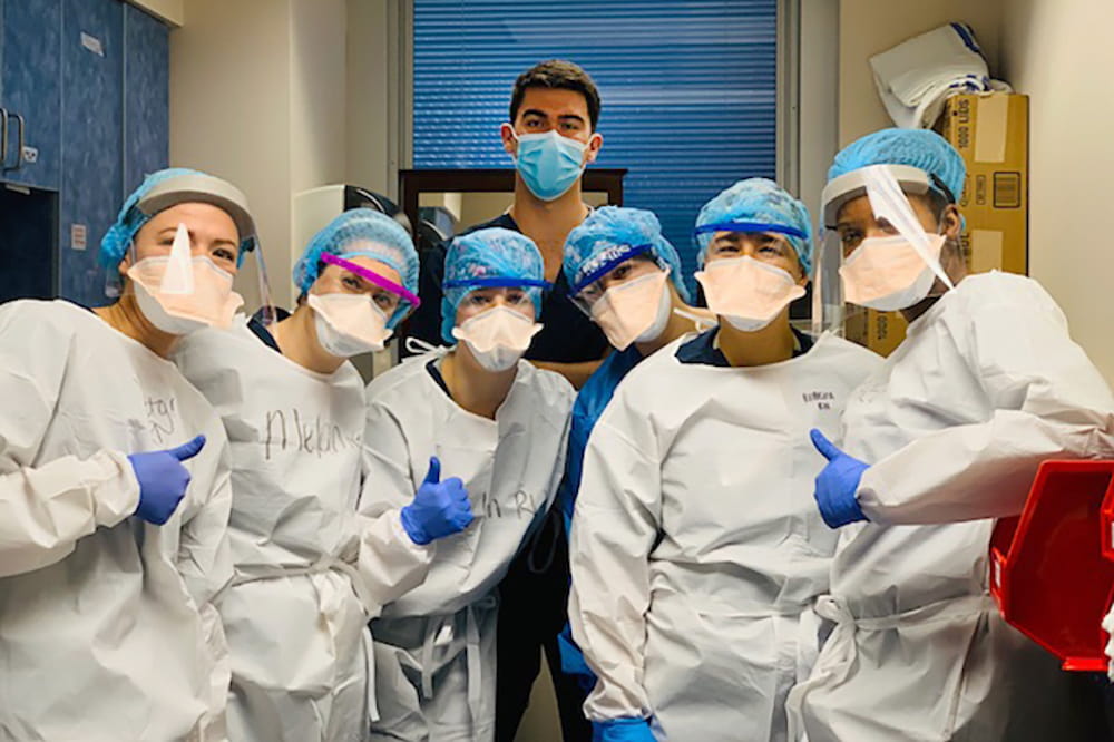 7 nurses posing for a photo on their unit