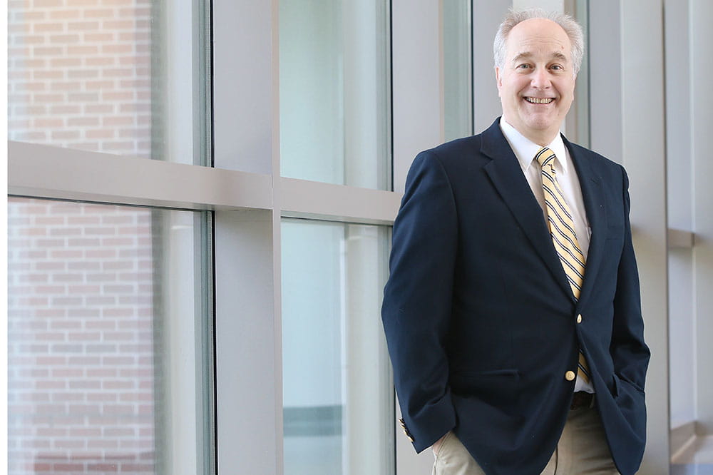 Dr. Michael Schmidt standing in a hallway