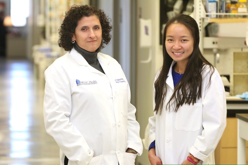 Dr. Carol Feghali Bostwick, professor in the Department of Medicine, and graduate student Xinh Xinh Nguyen.