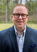 Headshot of Chase Glenn, director of LGBTQ+ Health Services and Enterprise Resources