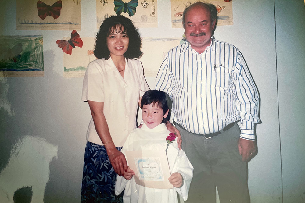Benjamin Magowan as a kindergartener with his parents.