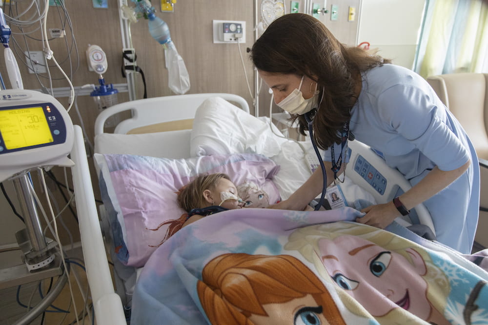 Dr. Elizabeth Mack with a pediatric patient