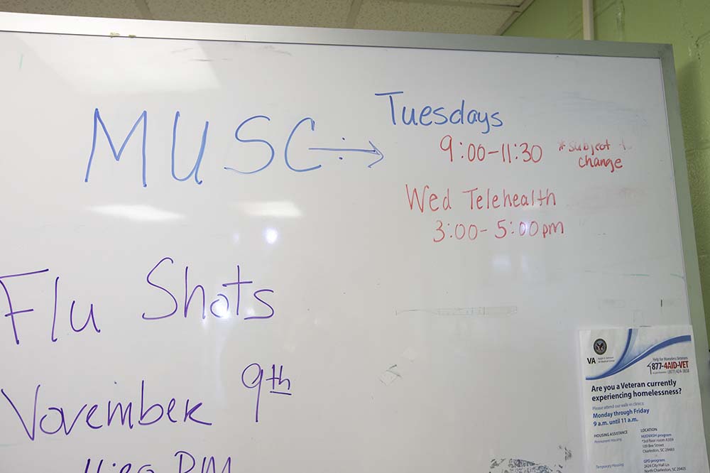 Whiteboard at The Navigation Center lists times people can see MUSC health care providers.