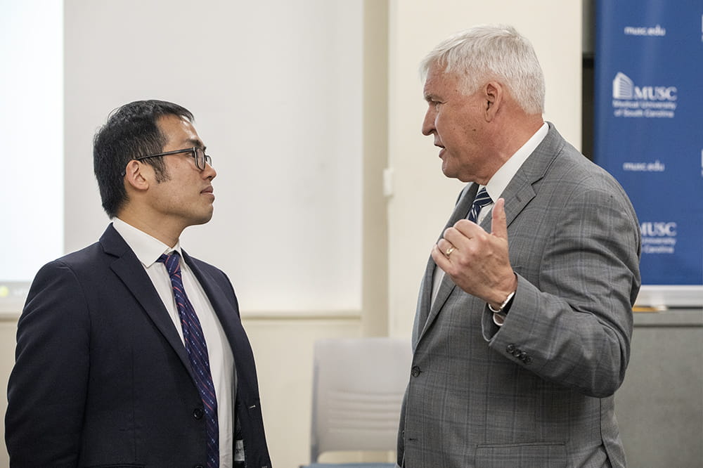 Dr. James Lu of Helix and Dr. David Cole of MUSC talk at news conference about In Our DNA SC.