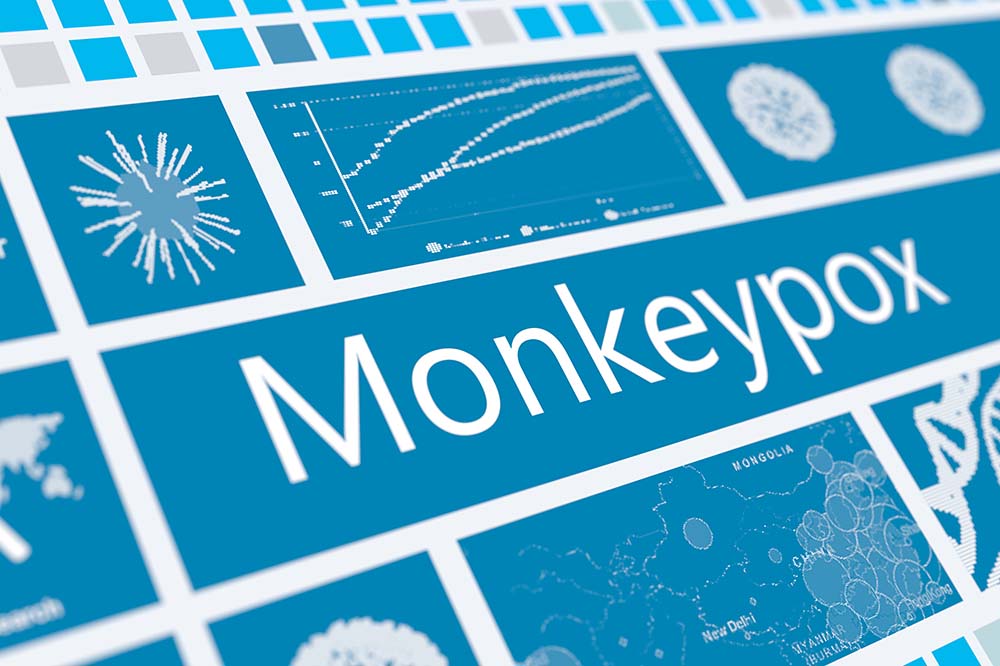 The word monkeypox on a blue background.