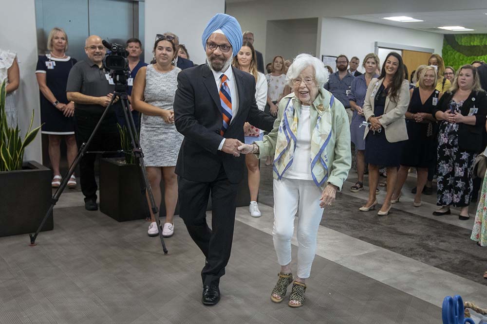 Dean Sarandeep Huja stands with Ann Edwards, the widow of the James B. Edwards College of Medicine's namesake.