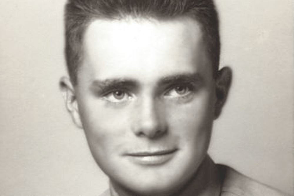 Man in black and white photo from his time of military service.