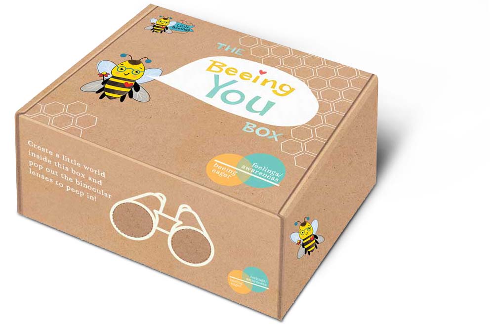 Brown box on a white background. The boxy has a bee on it that says beeing you.