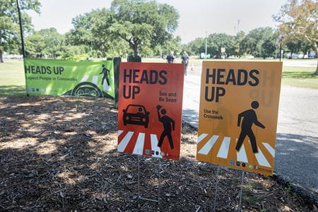 A close up of some of the Heads Up signs that will be posted around the city