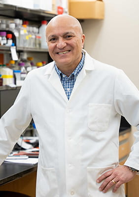 Besim Ogretmen, Ph.D., poses in his lab at MUSC Hollings Cancer Center