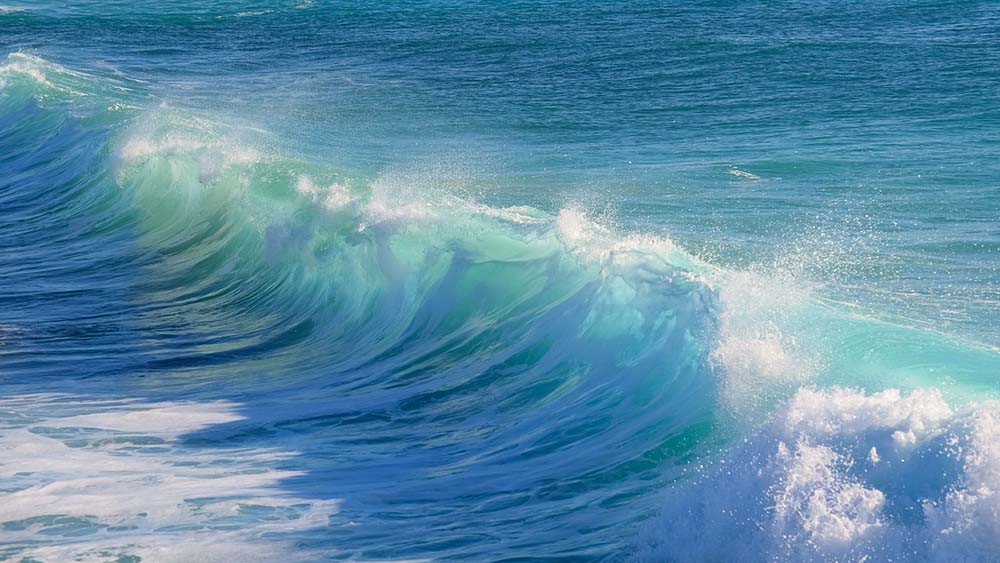 Ocean wave in the colors blue and white.