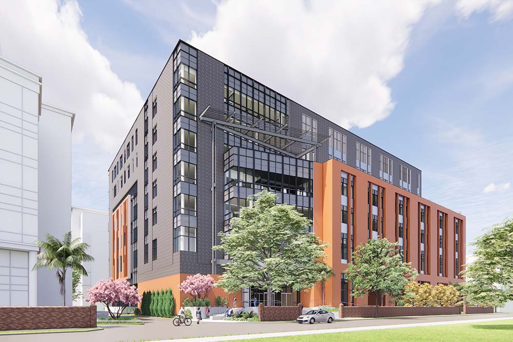 An image of a dark colored building against a blue sky